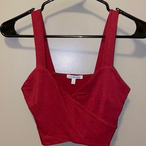 Dark red crop top.